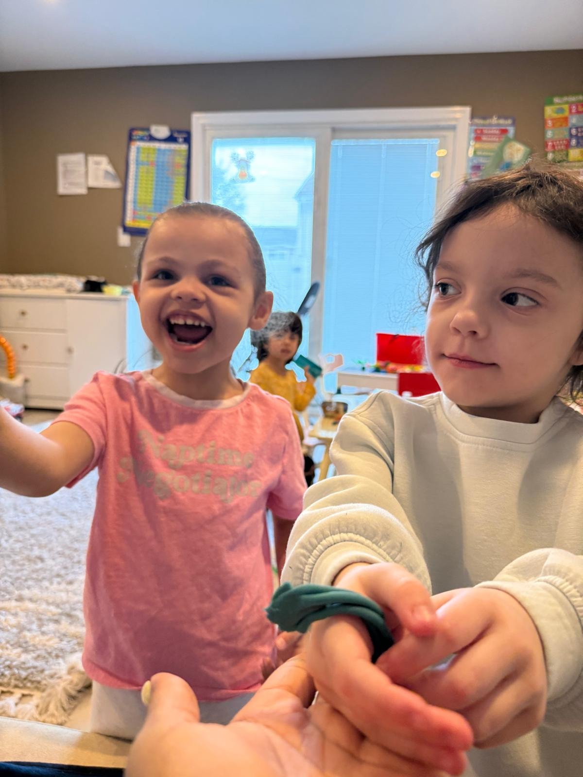 Child happily painting and doing arts and crafts
