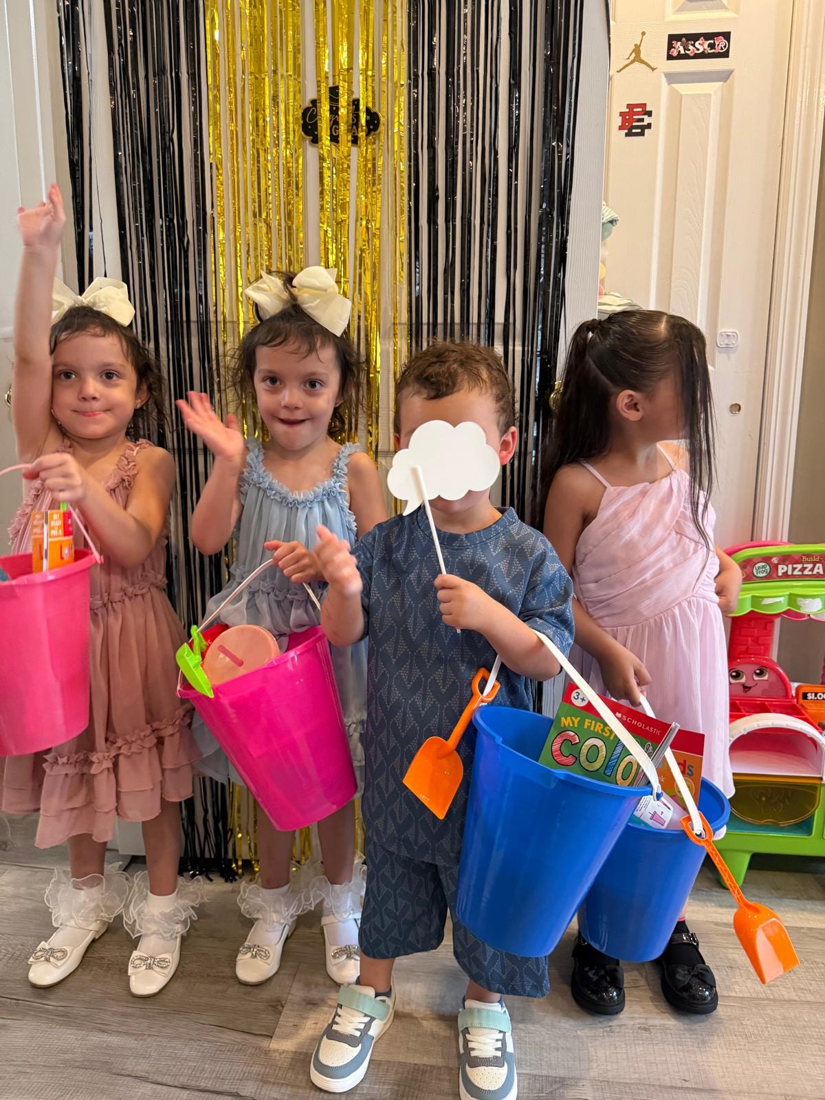 Children celebrating graduation day at Brighter Stars Daycare